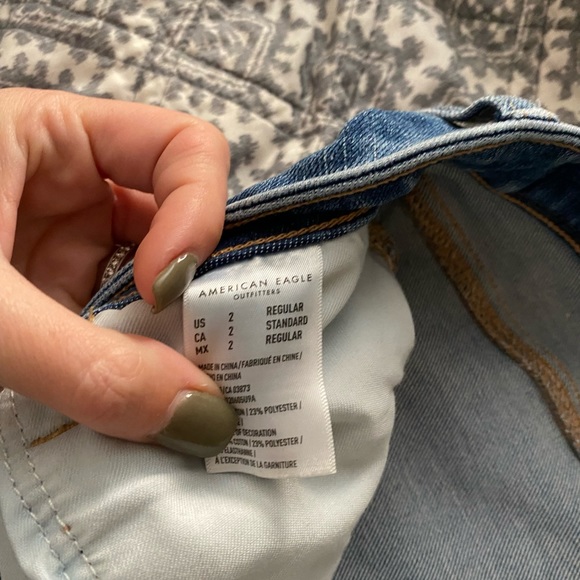 Worn very few times. Distress in knees and a little around ankle. - Picture 2 of 4